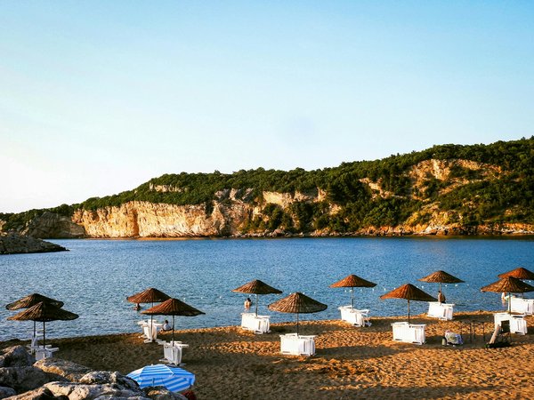 How does the NHS address the challenges of an aging population?